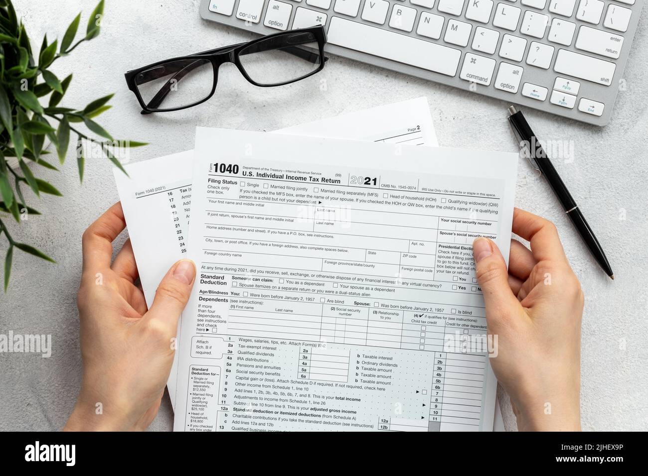 Accountant Culculate Taxes US Tax Form On Office Table Desktop 